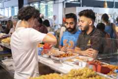 Customers at the olive trader