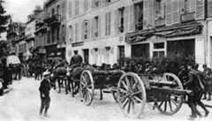 British Royal Field Artillery 18 Pounder Battery moving through a French Town: Battle of the Marne, fought from 6th to 9th September 1914, during the First World War