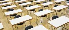 Empty desks in a hall
