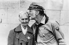 Man kissing his mother on Mother’s Day at Holy Trinity Polish Church