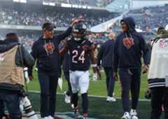 CTC-L-BEARS-STEELERS-112325 Bears defensive coordinator Dennis Allen congratulates cornerback Nick McCloud (24) as injured linebacker Tremaine Edmunds, right, watches after a 31-28 win over the Steelers on Sunday, Nov. 23, 2025, at Soldier Field. (John J. Kim/Chicago Tribune)