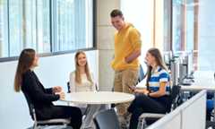Students sitting togther in a social space