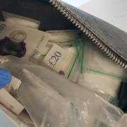 Police seized the cash and drugs