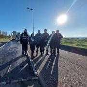Police in Weston Parade removing caravans