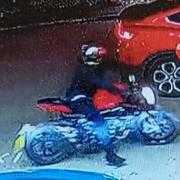 Two men on motorbike steal car from petrol station