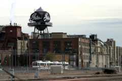 An RTD commuter light rail unit passes the Gates Rubber Co. manufacturing plant at 999 S. Broadway, Denver on Nov. 13, 2002. (Photo by Jerry Cleveland/The Denver Post)