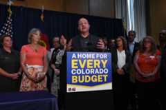 Colorado Governor Jared Polis holds a press conference with state and government officials in his office at the Colorado State Capitol where he signs an executive order addressing access to affordable housing on August 21, 2023 in Denver, Colorado. (Photo By Kathryn Scott/Special to The Denver Post)