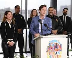 Denver Mayor Mike Johnston and City Council President Amanda Sandoval, left, speak during a news conference announcing the Vibrant Denver bond process at the Carla Madison Recreation Center in Denver, Feb. 12, 2025. The rec center was built as part of an earlier city bond package. (Photo by Andy Cross/The Denver Post)