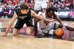 DCC-Z-CUatTTU5021226_6c6039 Colorado's Sebastian Rancik battles for a loose ball Wednesday at Texas Tech. (AP Photo/Chase Seabolt)