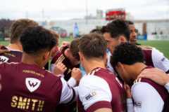 Detroit City FC 2026 Roster Updates - team huddling during a 2025 match