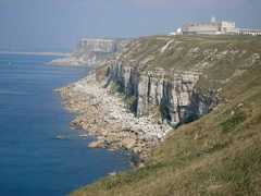 The impressive cliffs and the former torpedo research centre