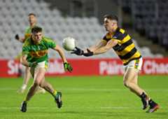 Canovee's Conor Dodd moves away from Aaron O'Mahony of Kilmurry. Picture: Jim Coughlan