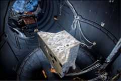 Figure 124: BepiColombo in LSS: BepiColombo's Mercury Planetary Orbiter flight model inside ESTEC's Large Space Simulator with simulated high-intensity sunlight being shone onto its surfaces in October 2014 (image credit: ESA_A. Le Floc'h)