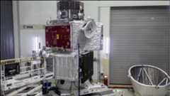 Figure 146: The complete BepiColombo spacecraft stack on 5 July 2017: From bottom to top: the Mercury Transfer Module (sitting on top of a cone-shaped adapter, and with one folded solar array visible to the right); the Mercury Planetary Orbiter (with the folded solar array seen towards the left, with red protective cover), and the MMO (Mercury Magnetospheric Orbiter). The Mercury Magnetospheric Orbiter’s Sunshield and Interface Structure (MOSIF) that will protect the MMO during the cruise to Mercury is sitting on the floor to the right (image credit: ESA–C. Carreau , CC BY-SA 3.0 IGO)