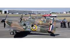 Hurricanes and spitfires of RAF Battle of Britain Flight return to North Weald Airfield in 2015