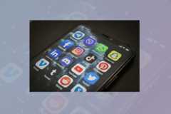 A smartphone screen displaying various social media app icons, set against a professional flat design background with soft patterns and gradients.