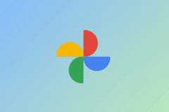 The Google Photos logo, consisting of four colorful, semicircular shapes arranged in a pinwheel pattern, centered on a professional flat design background with a soft blue-to-green gradient and subtle diagonal line patterns.