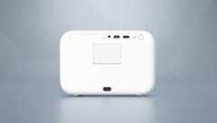 A white projector with various ports on the back, set against a professional flat design background with soft patterns and gradients.