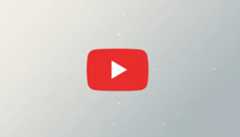 The YouTube logo, a red rectangle with rounded corners and a white play icon in the center, is presented on a professional flat design background with soft gray gradients and subtle geometric patterns.
