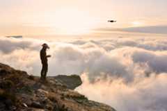 Man looking off mountain