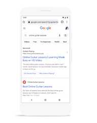 Mobile device showing search results for ‘online guitar lessons’ query