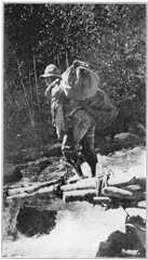 One of our Bearers Crossing the Pampaconas River