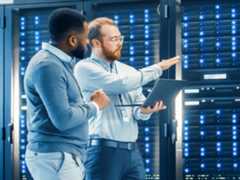 two men in a data center