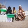 People in Yemen impacted by war and climate shocks receive aid from the IOM. Photo credit: Majed Mohammed/IOM Yemen