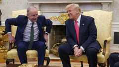 <p>Taoiseach Micheál Martin (left) with US president Donald Trump in the White House at last year's St Patrick's Day reception. While it may be seen as pragmatic diplomacy to go, how will it seem from a future perspective?</p>