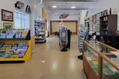 The interior of the Chicago & North Western Historical Society (C&NWHS) archive and museum building showing merchandise for sale and historical exhibits