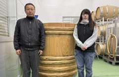 At Buryu Winery, owner Keiji Yamaguchi (left) and assistant winemaker Kaede Narita created a cedar-infused red wine by fermenting it in a 1,000 liter "kioke" cedar tub. At Buryu Winery, owner Keiji Yamaguchi (left) and assistant winemaker Kaede Narita created a cedar-infused red wine by fermenting it in a 1,000 liter "kioke" cedar tub.