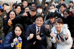 Yuichiro Tamaki, head of the Democratic Party for the People, poses with his supporters during an election campaign event on the first day of campaigning for the Feb. 8 snap election, in Tokyo, Japan, Jan. 27.