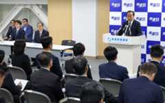 Centrist Reform Alliance co-leader Yoshihiko Noda (right) speaks at the party's plenary assembly in Tokyo on Wednesday.
