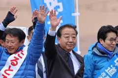 Yoshihiko Noda, co-leader of the Centrist Reform Alliance, waves during a campaign event in Osaka on Feb. 3. The alliance suffered a crushing defeat in the Feb. 8 election.