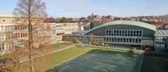 Photo of The Halley Academy building taken from a green space on the academy grounds.