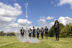 Students testing out their rockets on the school field