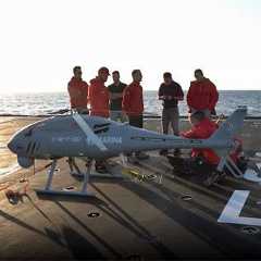Engineers working with AWHERO on-board a naval platform