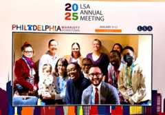#LSA2025 Selfie Frame with group of members including older and younger - including a baby, men and women, Black, White and Asian individuals, all smiling and looking at the camera, 