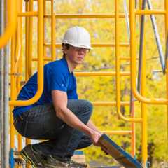 Student volunteering at a construction site.