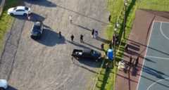 TMC-L-FountainParkShooting-194099546 Police surround a basketball court June 1, 2024, at Fountain Park in Allentown after a 25-year-old man was fatally shot. (Rich Rolen/Special to The Morning Call)