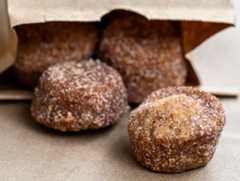 Back Door Bakeshop’s apple cider donut holes Tuesday, Nov. 25, 2025, at Scholl’s Orchard in Bethlehem. The orchard stand features unpasteurized apple cider, and a variety of apples, vegetables and long-neck pumpkins. Back Door Bakeshop is having a Thanksgiving dessert pop-up market, featuring apple crumb pie, pumpkin pie and apple cider doughnut holes, 9 a.m. to 5 p.m. Wednesday while supplies last at Scholl’s. (April Gamiz/The Morning Call)