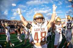 Lehigh players celebrate their win in a Patriot League battle against Lafayette on Saturday, Nov. 22, 2025, at Lafayette’s Fisher Stadium in Easton during the 161th edition of college football’s most-played rivalry. (Jonathan Broady/Special to The Morning Call)