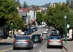 Traffic on Magnolia Avenue passes through downtown Larkspur, Calif., on Thursday, Oct. 18, 2018. (Alan Dep/Marin Independent Journal)
