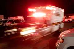 (EDITORIAL USE ONLY) An Empress EMS ambulance responds to an emergency call on April 14, 2020 in Yonkers, Westchester County, New York. Empress EMS medics work throughout Westchester County and parts of New York City, the epicenter of the coronavirus (COVID-19), pandemic in the United States. (Photo by John Moore/Getty Images)