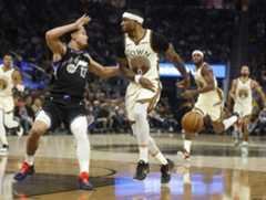 Golden State Warriors' Gary Payton II (0) passes the ball to Golden State Warriors' Buddy Hield (7) against Utah Jazz's Walter Clayton (13) in the second quarter at the Chase Center in San Francisco, Calif., on Monday, Nov. 24, 2025. (Nhat V. Meyer/Bay Area News Group)