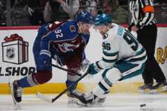 Sharks Avalanche Hockey San Jose Sharks center Philipp Kurashev, right, loses control of the puck as Colorado Avalanche left wing Gabriel Landeskog defends in the second period of an NHL hockey game, Wednesday, Nov. 26, 2025, in Denver. (AP Photo/David Zalubowski)