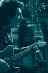 Ronnie Wood playing guitar