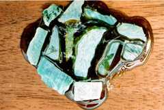 Pic 15: Experimental use of copal as an adhesive. Jadeite chips are attached to Cedrela Odorata wood. 