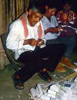 Pic 7: Nahua ritual specialists cut paper images of the spirits.
