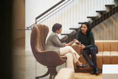 Decision maker collaborating in an open, casual space.